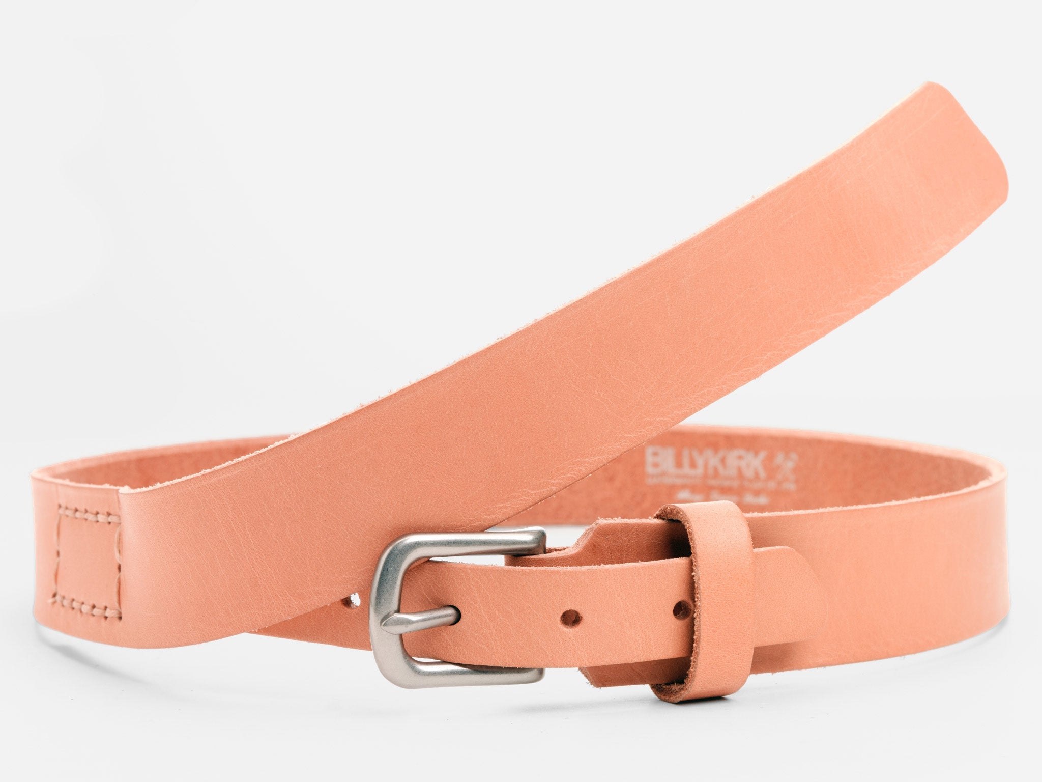 A light pink leather belt with a silver buckle, displayed in a looped position against a plain white background.